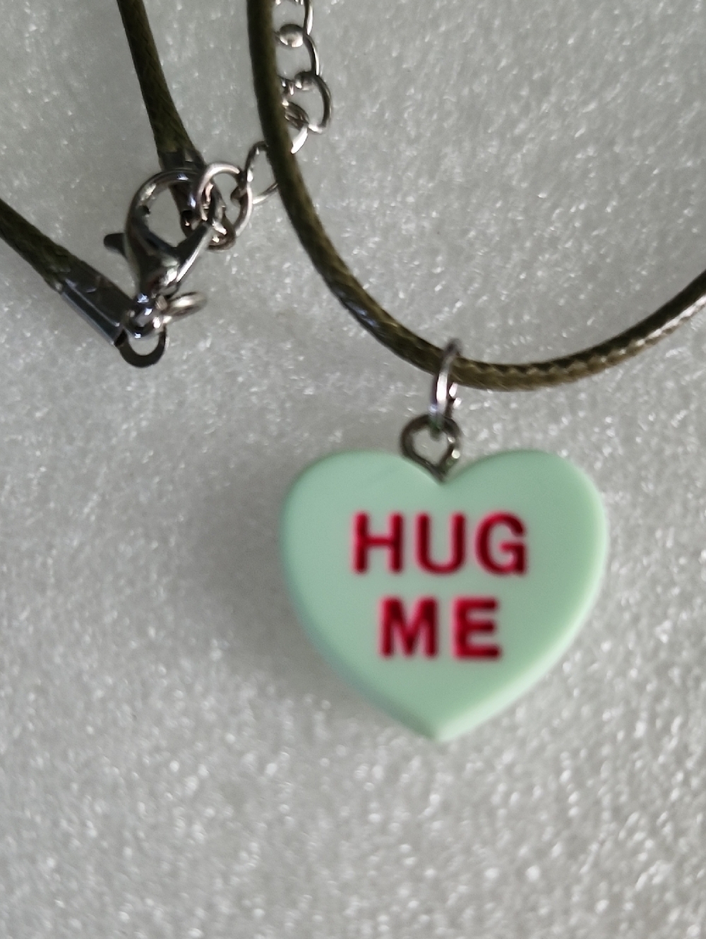 Hand Crafted Mint Green Heart 'HUG ME' Necklace with Red Lettering